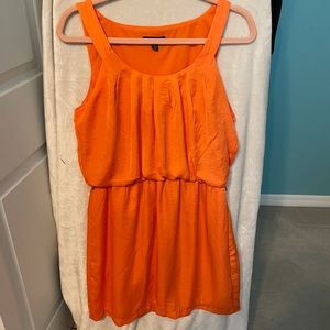 City Triangles orange pleated mini dress